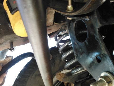 1996 Ford Bronco - the tierod is blocking the view but this is where the sway bar will be and it wont hit the coil. this hieght allows the most travel up and…