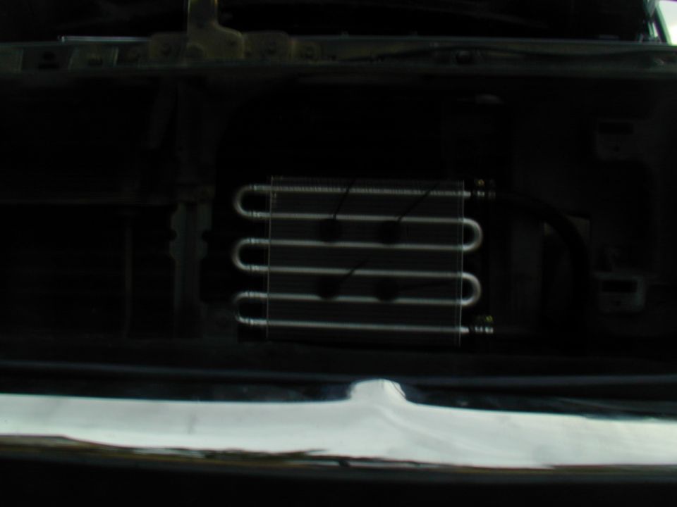 Radiator with U-shaped tubes, part of a vehicle's cooling system