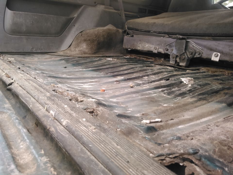 due to my 425w engine build, i wanted to upgrade my fuel pump to a 255lph pump. also i wanted to fix my fuel guage which never worked since ive owned the truck

you can see how badly my floor has been crushed. this is from carring all my tools while severe offroading. i now cover the floor with a 3/4inch sheet of wood. because of this i am not worried about patching the floor