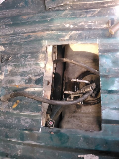 1996 Ford Bronco - disconnect the fuel lines and electrical. knock the lock ring off. i had plenty of mud on the lock ring. i used a small hammer to lightly t…
