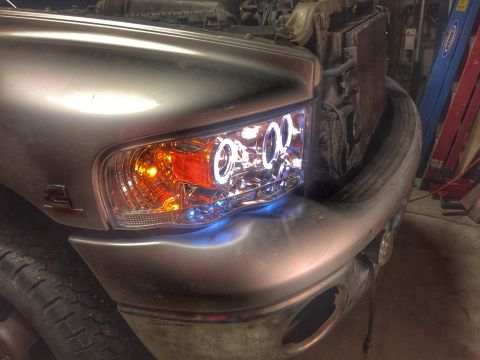 2004 Dodge 3500 - This 2004 Dodge 3500 features custom halo headlights with blue accent lighting.