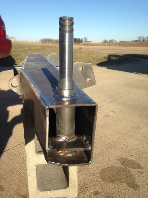 1979 Ford Bronco - A custom-fabricated metal component, likely for a vehicle suspension or trailer, is shown outdoors.