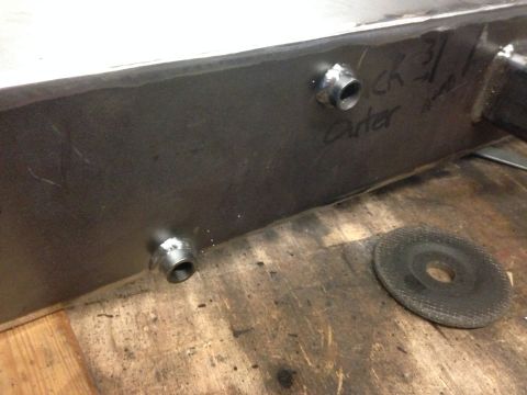 1979 Ford Bronco - A fabricated metal part with threaded fittings and handwritten markings is shown, possibly for a rear bumper fabrication.
