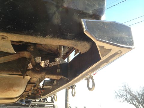 1979 Ford Bronco - Custom rear bumper fabrication with integrated tow hooks is shown from an underside perspective.
