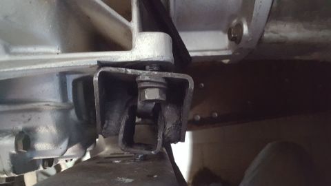 1991 Ford Bronco - Crossmember from the junkyard doesn't have enough travel for the mount to sit flush. I'll fab my own up.