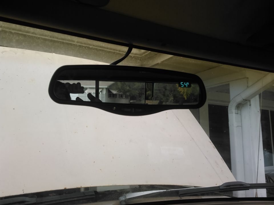 the rear view mirror showing temperature outside. for being in Florida its pretty chilly outside