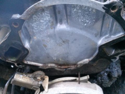 1996 Ford Bronco - This image shows a close-up of a corroded metal engine component, not a complete vehicle.
