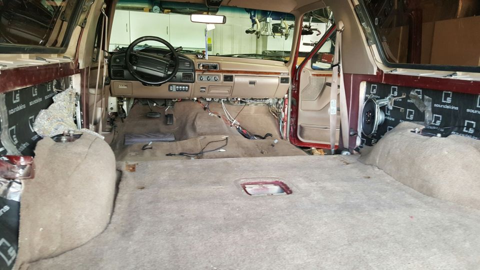 Gutted interior with new tan carpet, SoundSkins deadening on quarter panels and tan dash