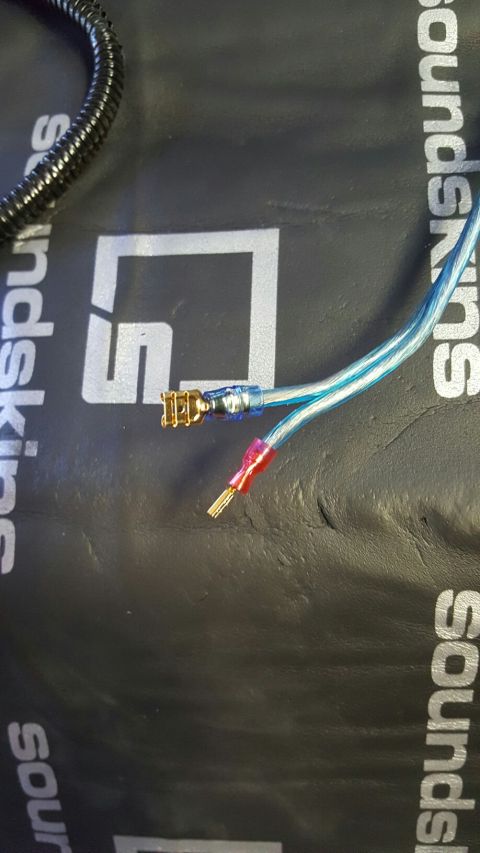 1996 Ford Bronco - Electrical wiring components are shown on sound deadening material, with text visible on the material.