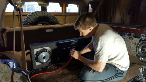 1996 Ford Bronco - Installing aftermarket audio components in the rear of a vehicle.