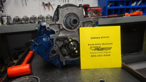 1982 Ford Bronco - A Ford 427w engine block is shown with a yellow sign providing details about a rebuild and contact information for Custom Crate Engines.