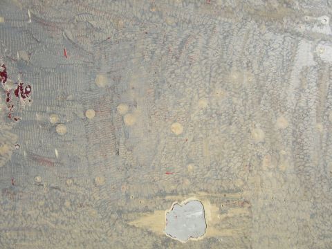1976 Chevrolet Corvette - Damaged car body panel shows texture and a hole, not a 1976 Corvette.