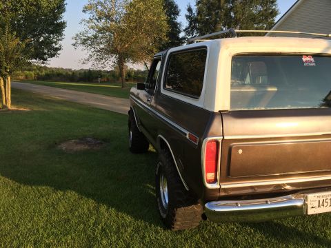 1978 Ford Bronco - This 1978 Ford Bronco is parked on a grassy lawn next to a paved driveway.