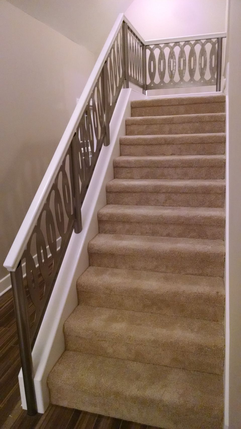 This temporary handrail doesn't cover the posts, but it's enough to get a certificate of occupancy.  I'll build a wider one from cedar that grew on this property later.