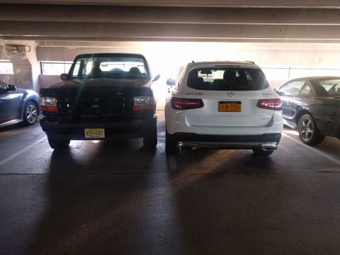 1995 Ford Bronco - His mirror is folded, mine is just broken (unrelated).