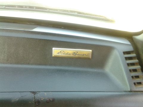 1991 Ford Bronco - The interior of a 1991 Ford Bronco shows an "Eddie Bauer" badge on the dashboard.
