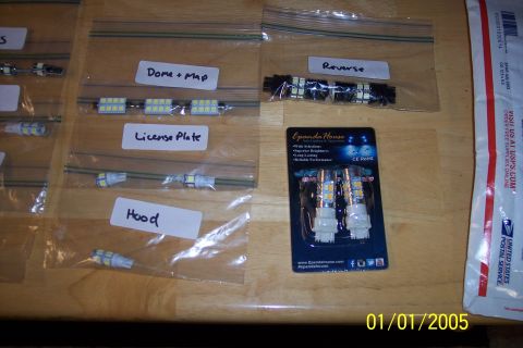 1995 Ford Bronco - Various LED bulbs are organized in plastic bags and a blister pack, ready for installation.