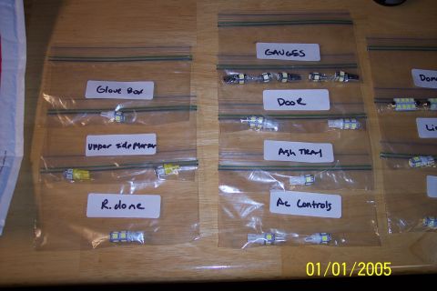 1995 Ford Bronco - Various LED bulbs are organized and labeled in plastic bags for different interior and exterior car locations.
