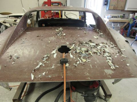 1976 Chevrolet Corvette - This car body panel, likely from a 1975 Chevrolet Corvette, is undergoing restoration work.