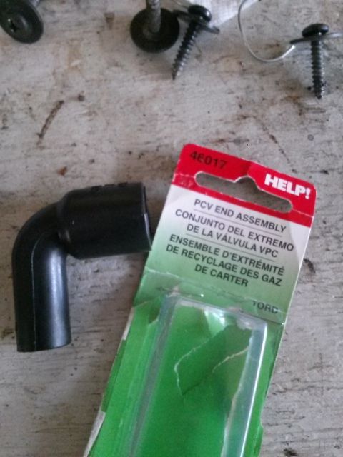 1996 Ford Bronco - A black PCV end assembly is shown next to its packaging, which displays the part number 46017 and the brand HELP! The packaging also includ…
