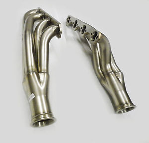 1982 Ford Bronco - A pair of polished stainless steel exhaust headers are displayed against a plain white background. The headers are designed for a V8 engine…