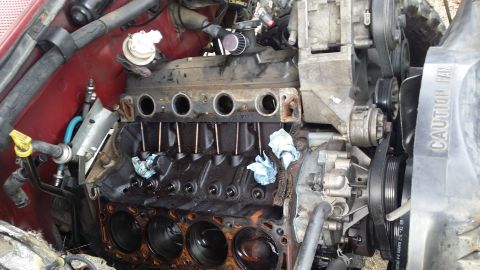 1996 Ford F-250 - Just for two exhaust manifold bolts....