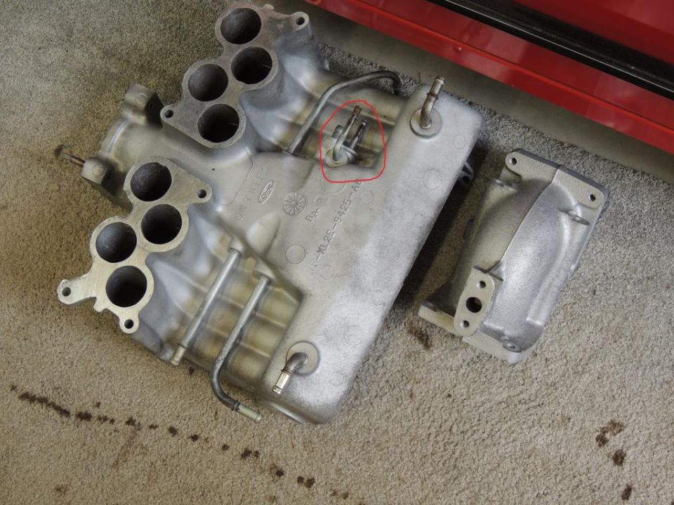 Ford intake manifold with part number KL25-9425-A visible