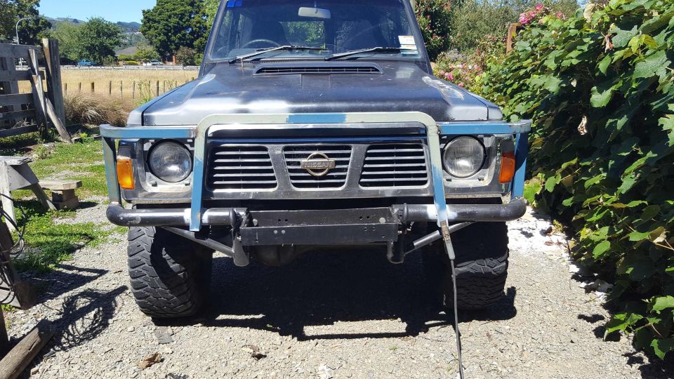 Front view of a Nissan Patrol with a bull bar.