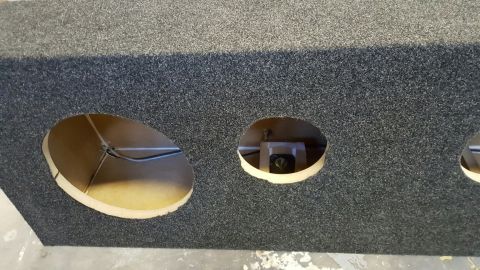 1996 Ford Bronco - Custom speaker enclosure with openings for audio components.