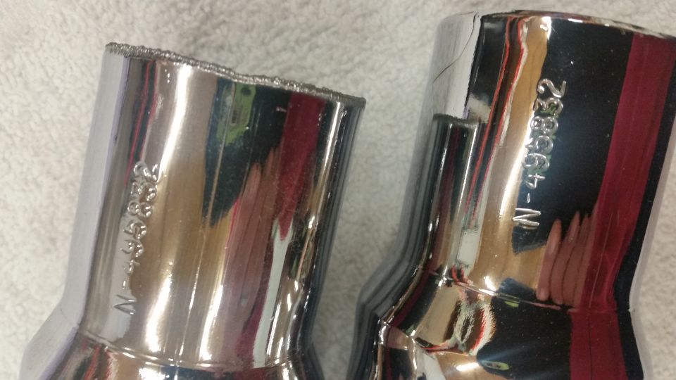 Two chrome exhaust tips with part numbers N-498832 and N-333554.
