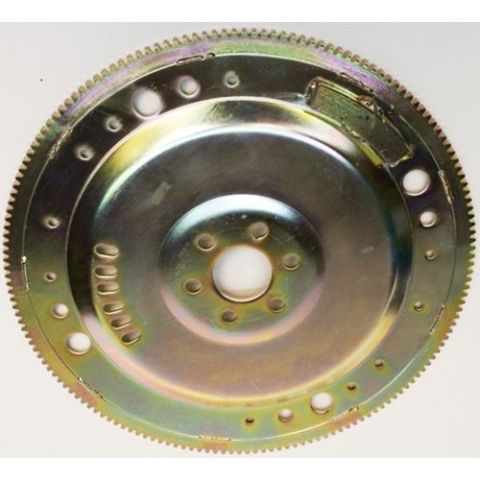 1982 Ford Bronco - A close-up, straight-on view of a metal flywheel with a ring gear. The flywheel has multiple bolt holes and a series of smaller holes aroun…