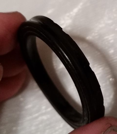 1995 Ford Bronco - As one can see in this picture, the burrs have cut into parts of this piston/seal. I also removed quite a bit of what I can only describe a…
