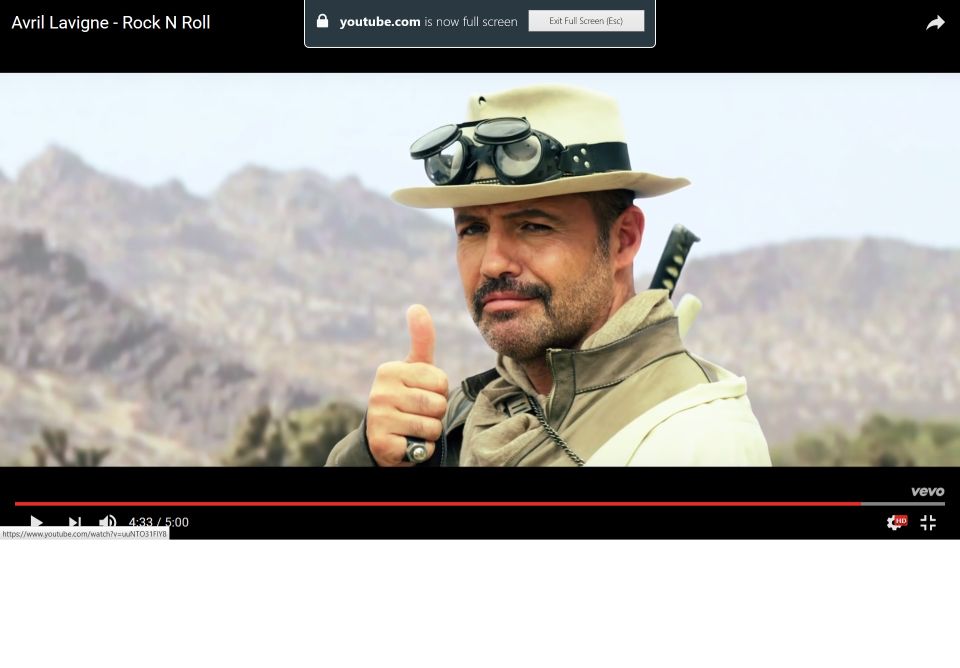 Screenshot of a YouTube video showing a man in a hat and goggles giving a thumbs up.