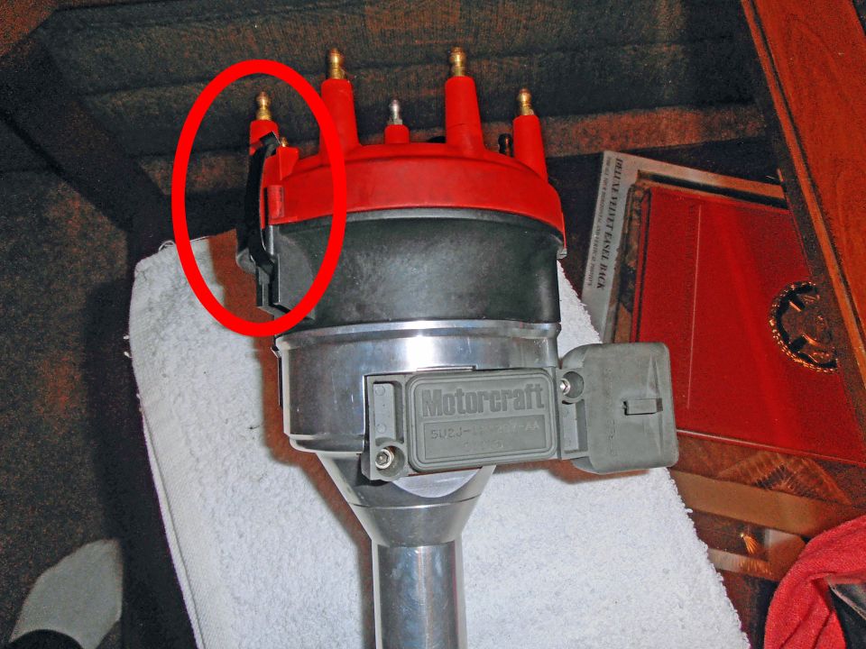 Motorcraft distributor cap with red top and black clip