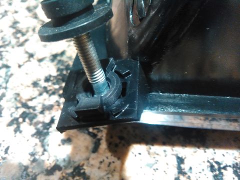 1996 Ford Bronco - you just rotate the center section 90 degrees counterclockwise. it will take abit of force to force it ove rthe locking bump