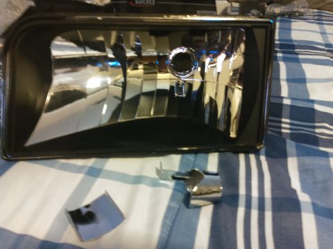 1996 Ford Bronco - i took the little center shroud off. was only held in by 1 screw. there was a little chrome piece on the top which i originally took off bu…