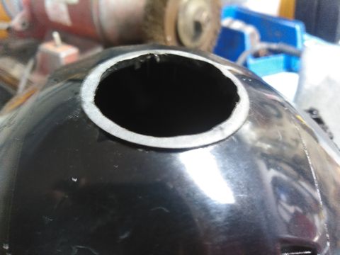 1996 Ford Bronco - i used a grinder to grind the locking area off. i later used a sander to get it nice and flush. i used a dremel to englare the center hole…