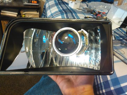 1996 Ford Bronco - the projector inside the housing without the shroud. before you do final install, make sure the projector is right side up. the lens flips…