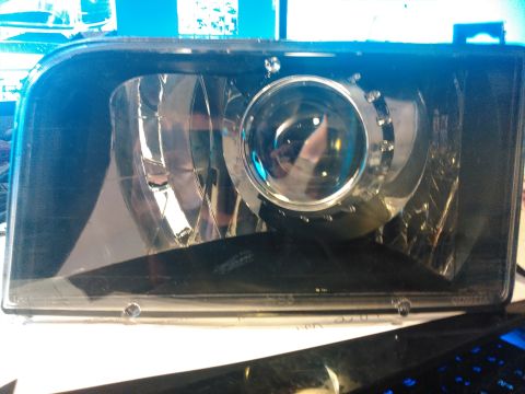 1996 Ford Bronco - projector inside the housing with the shroud and lens on