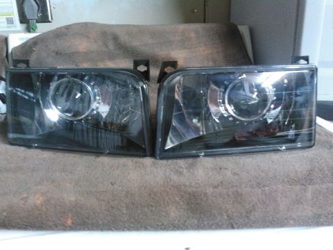 1996 Ford Bronco - both projectors dry-fitted without glue on the lenses. i am going to clean them up better, test them out and then glue them up. i highly re…