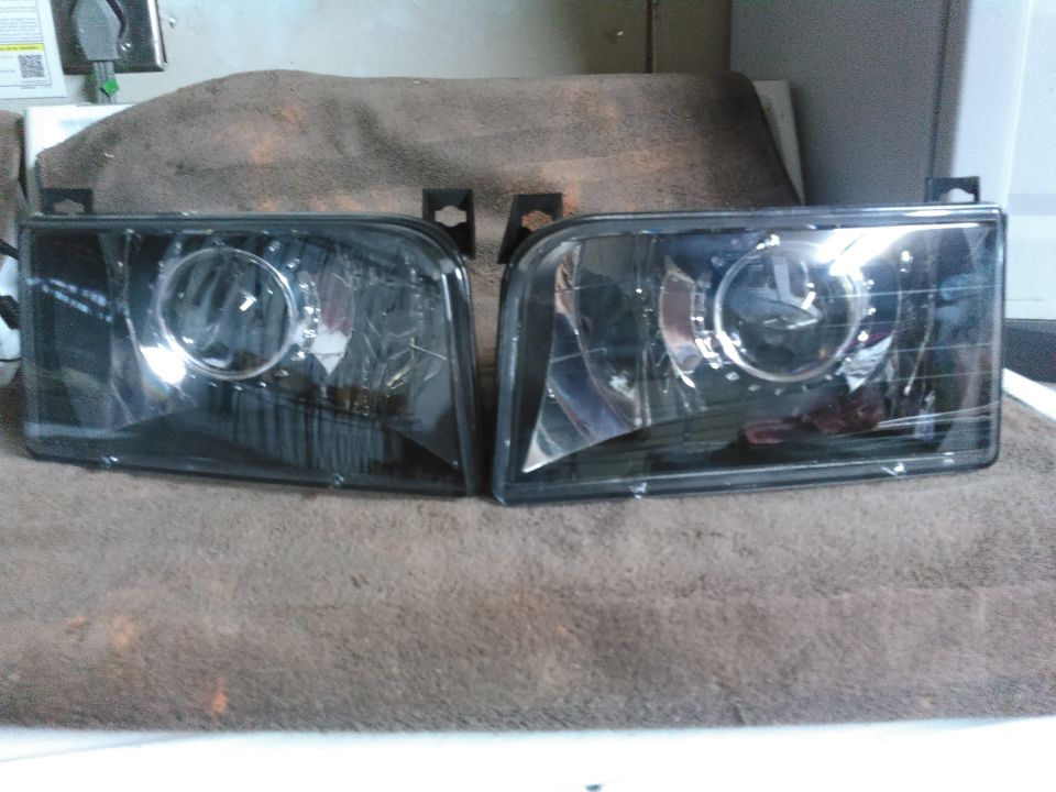 both projectors dry-fitted without glue on the lenses. i am going to clean them up better, test them out and then glue them up.

i highly recommend testing them before final install. i did and found the projector was upside down. the projector flips the light and the highbeam deflector actually needs to be on the bottom