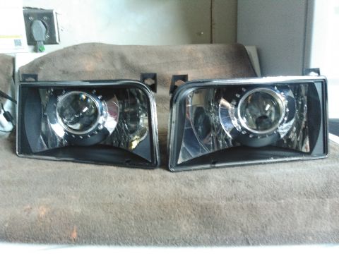 1996 Ford Bronco - both projectors installed temporary with the shrouds on but lenses off