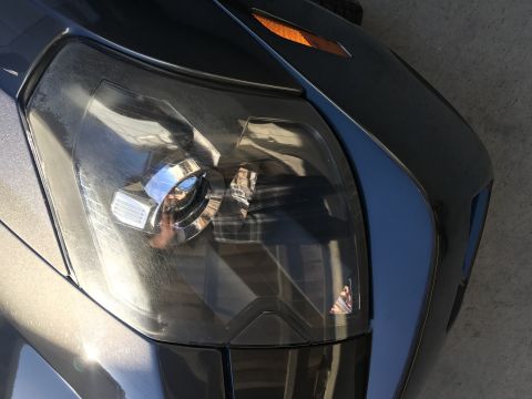 2007 Cadillac CTS - 1st attempt st polishing the head lights by hand.