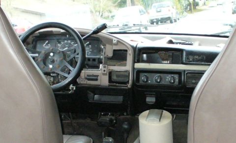 1992 Ford Bronco - Dash updates. Replaced missing HVAC panel & knobs, mounted trailer brake controller, replaced cracked dash pad, new steering column shroud,…