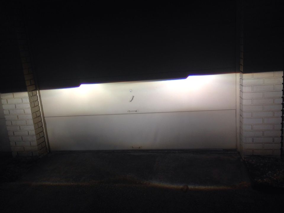 the new projectors. they wern't adjsuted but you can see how the light has much better distribution while still being very bright. they have a sharp cutoff to prevent blinding the cars ahead of you. the reason of the drop in the center is to prevent blinding oncoming traffic