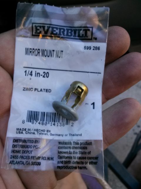 1996 Ford Bronco - A close-up shot shows a package of Everbilt Mirror Mount Nuts, size 1/4 in-20, zinc plated. The packaging also includes a barcode and distr…