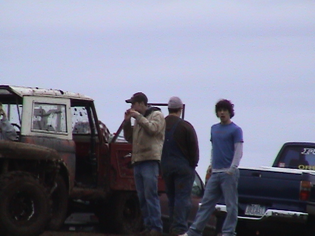 The guys standing on the hill