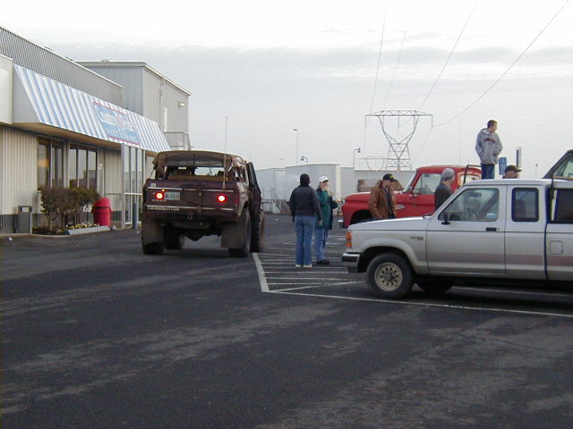 Berne leads the group to Mud Fest 2004, and a big group it becomes