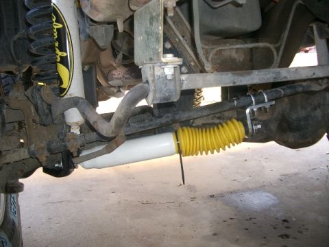 1994 Ford Bronco - Close-up of the front suspension and steering components on a 1994 Ford Bronco.