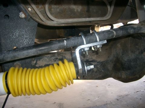 1994 Ford Bronco - This photo shows a steering stabilizer shock assembly, not the full vehicle.